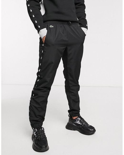 Lacoste - Pantalon Lacoste Sport pour homme en coloris Noir | Lyst