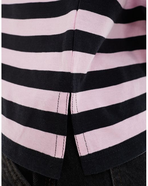 Top a maniche lunghe a righe nere e rosa di Monki in Multicolor