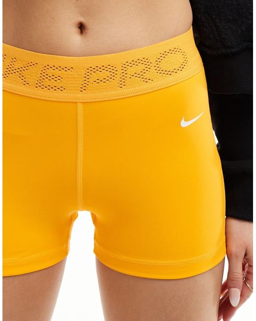 yellow nike pros