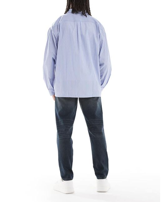 ASOS Blue Tapered Fit Jeans for men