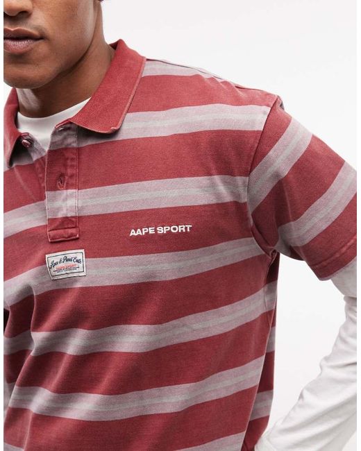 Aape By A Bathing Ape Red Aape By A Bathing Ape Oversized Striped Polo for men