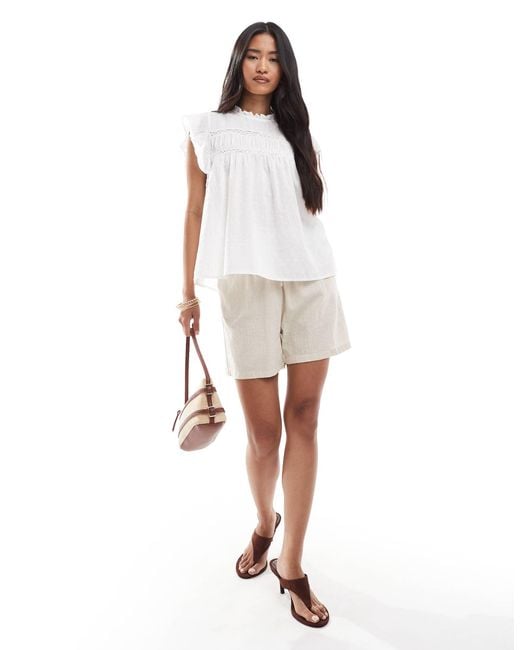 Top avec manches à volants et détails en plumetis ONLY en coloris White