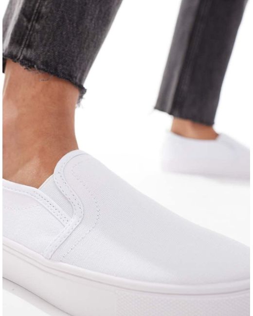 ASOS White Wide Fit Dotty Slip On Plimsolls