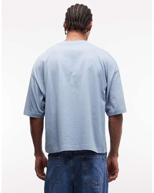 ASOS Blue Boxy Oversized T-Shirt With Sports Graphic for men
