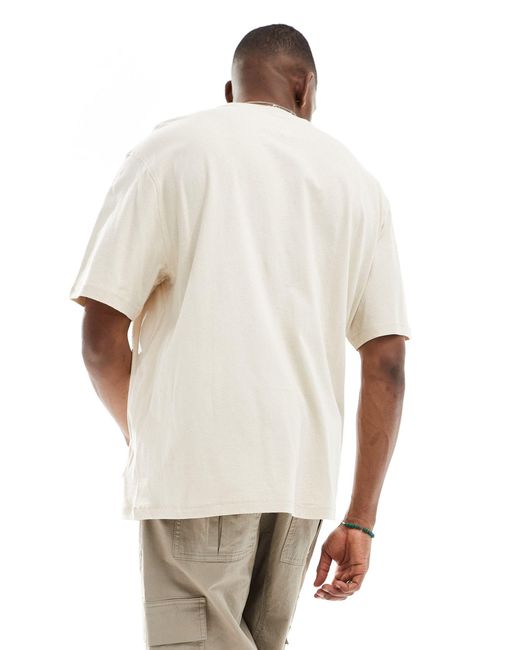 Camiseta blanco hueso extragrande con logo Tommy Hilfiger de hombre de color White