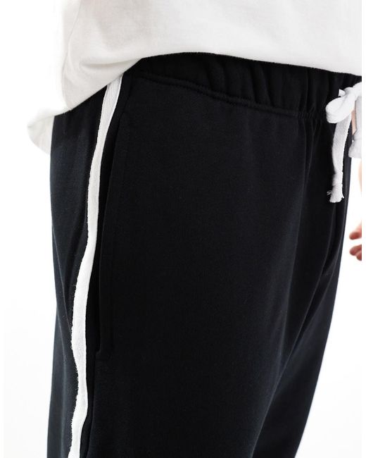 Joggers Negros Extragrandes Con Raya Lateral De Tejido Grueso De 400 G/M2 De ASOS de hombre de color Black