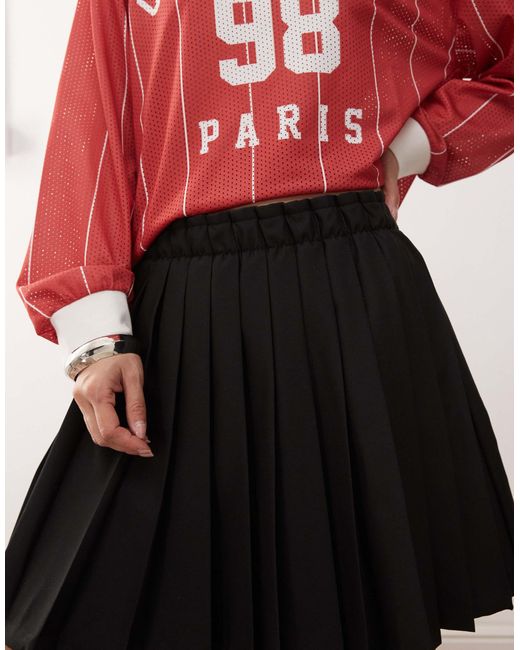 Monki Red – midi-faltenrock