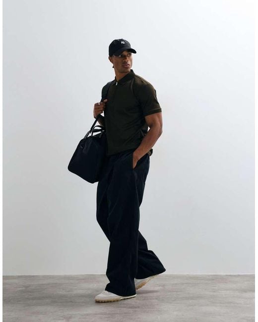 SELECTED Black Half Zip Polo for men