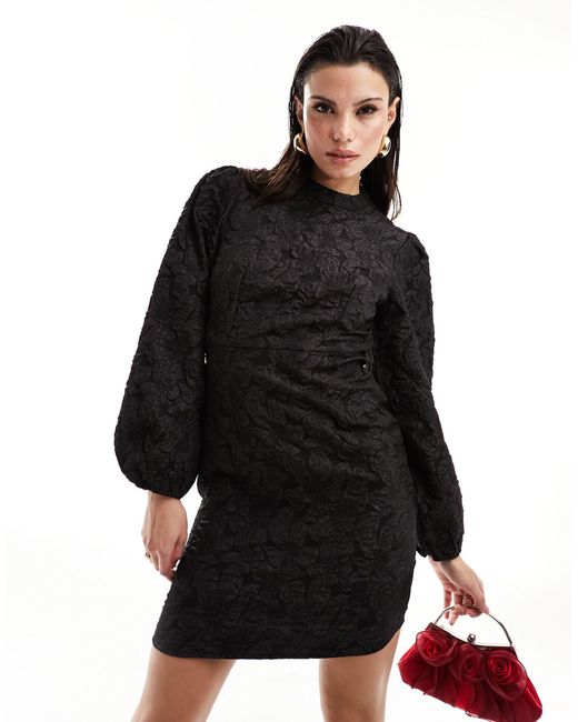 Robe courte en jacquard à col montant et manches volumineuses Vila en coloris Black