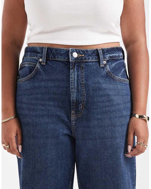 Vaqueros Capri Cómodos Y Elásticos De Pernera Recta Con Lavado Oscuro De Asos Design Curve-Azul ASOS de color Blue