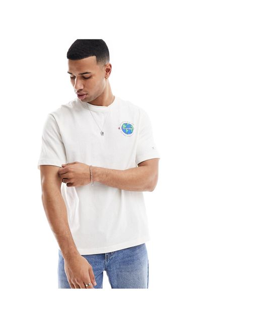 Camiseta blanca con estampado gráfico Champion de hombre de color Blue