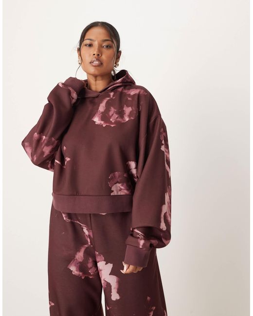 Asos design curve - sweat à capuche d'ensemble avec motif fleurs intégral - prune ASOS en coloris Red