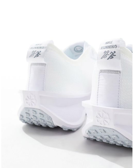 Interact run - sneakers bianche e argento di Nike in White