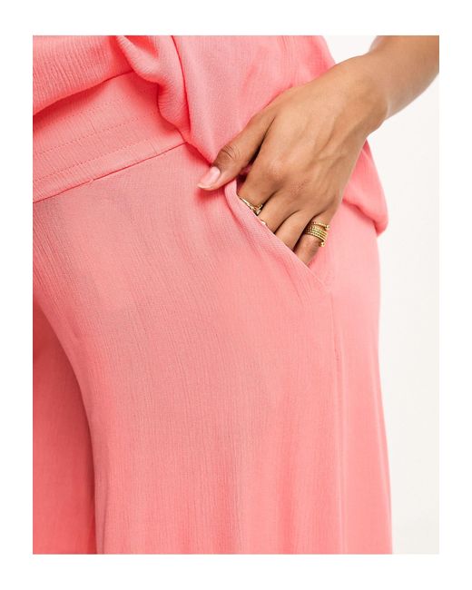 Vero Moda Vero Moda - Zwangerschapskleding - Gesmokte Broek Met Wijde Pijpen in het Pink