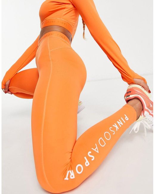 Pink Soda Orange Cross Waistband Leggings