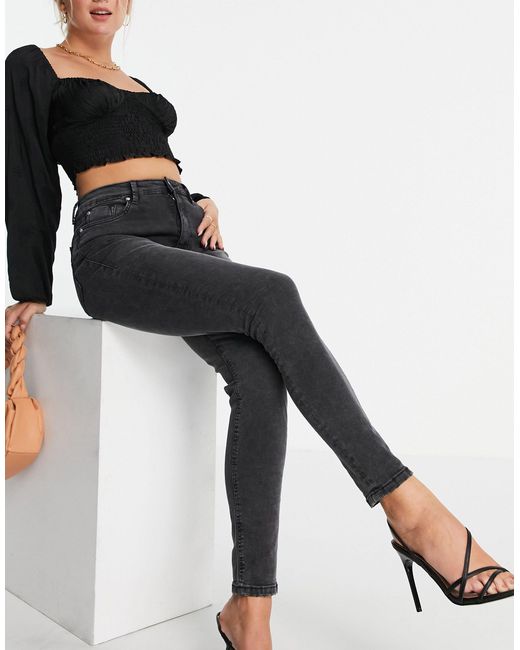 Jeans skinny grigi a vita altaMango in Denim di colore Grigio | Lyst