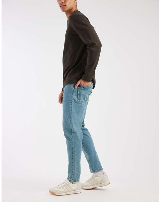 ASOS Blue Stretch Tapered Jeans for men