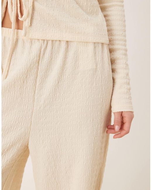 Pantalon d'ensemble ample en jersey texturé - crème Vila en coloris Natural