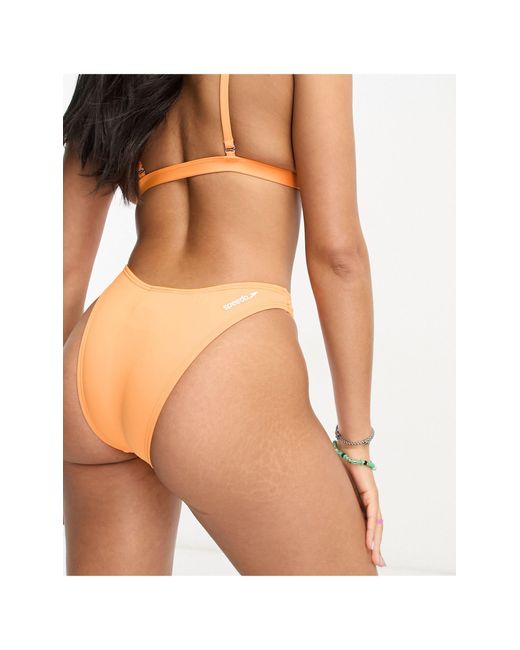 Slip bikini sgambati color pesca di Speedo in Orange