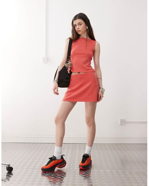 Mini-jupe trapèze Collusion en coloris Red