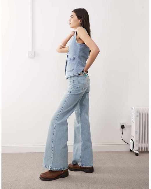 Reclaimed Vintage Blue Denim 70s Palazzo Jeans With Patch Pockets And Button Fly Detail