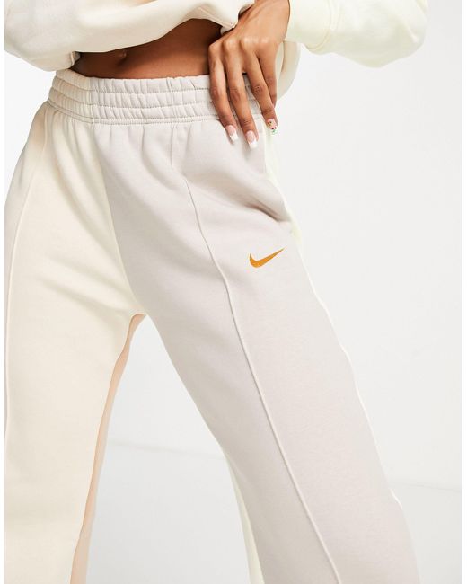 Nike Metallic Swoosh Colour Block Trackies in White | Lyst UK