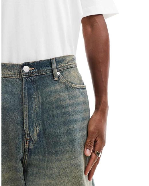Pantalones Cortos Vaqueros De Corte Skater Alargado Con Lavado Arena Ron De -Azul Jack & Jones de hombre de color Gray