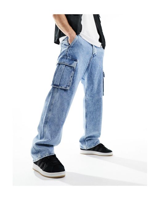 Jeans cargo con fondo ampio lavaggio blu da Uomo di Jack & Jones in Blu |  Lyst