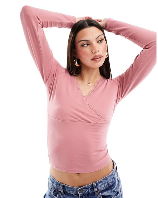 Hollister Lace Trim Wrap Long Sleeve Top in Pink