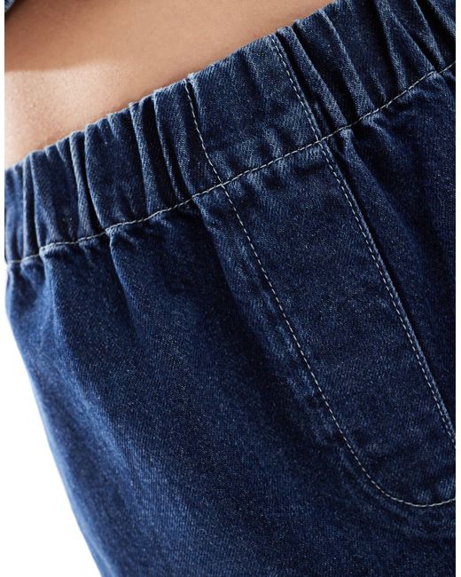 Pantaloncini di jeans stile boxer indaco di ASOS in Blue