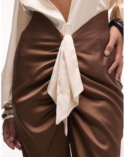 The Dolls House Natural Anthia Premium Satin Plunge Neck Balloon Sleeve Flared Jumpsuit