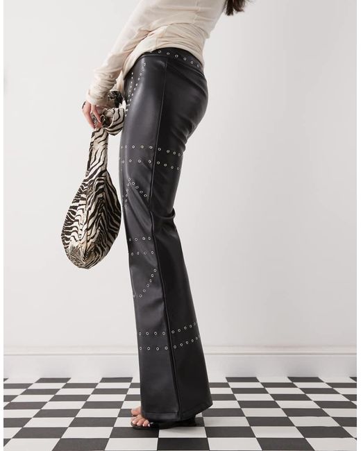 The Kript Black Low Rise Leather Pants With Studs