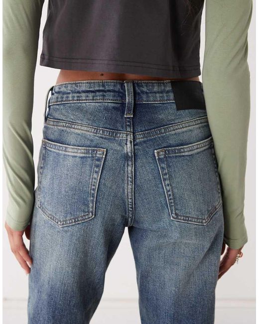 Vaqueros Azul Oscuro Deslucido De Corte Bootcut Acampanado Slim Tension De Weekday de color Blue