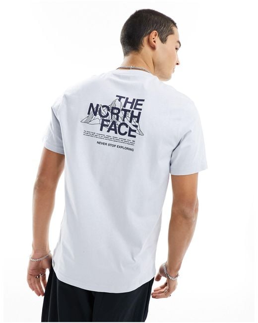 Camiseta azul claro con estampado The North Face de hombre de color White