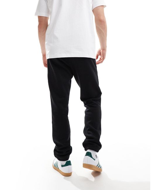 Adidas Originals Black Trefoil Essentials Joggers for men