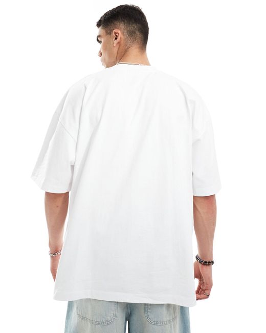 T-shirt super oversize bianca con stampa grunge sul petto di ASOS in White da Uomo