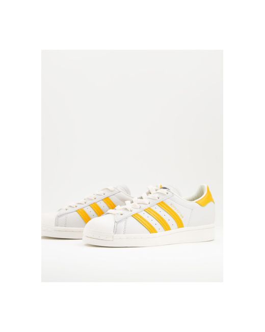 adidas jaune superstar