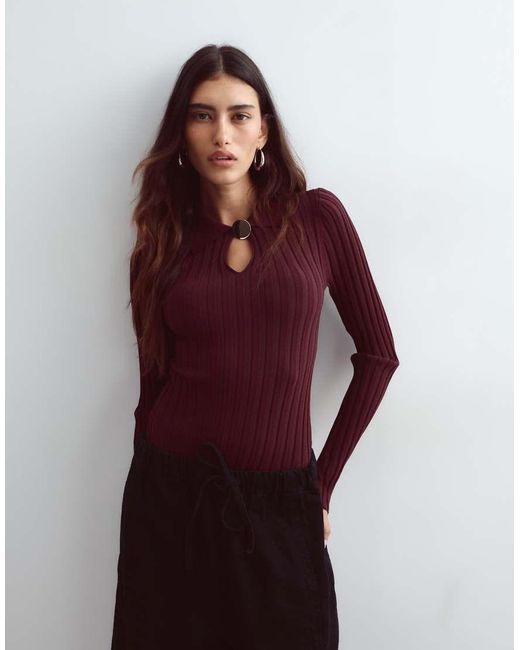 ARRANGE Red Knitted Ribbed Bodysuit With Oversized Button