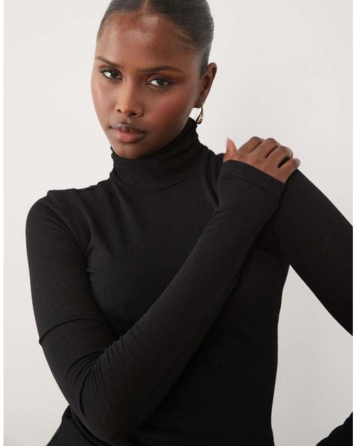 Noughts & Kisses Black Sheer High Neck Top