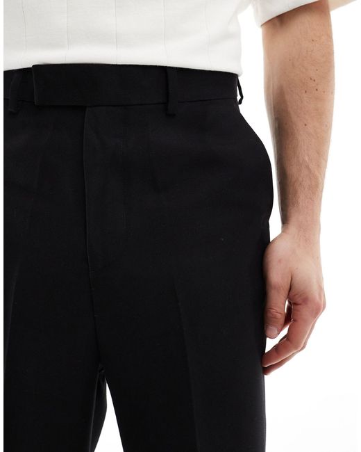 Pantaloni dritti eleganti a vita alta neri di ASOS in Black da Uomo