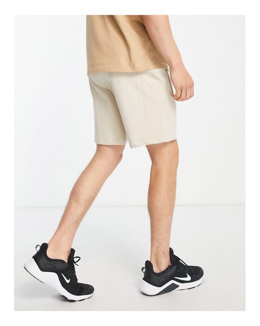 Pantalones cortos color pálido deportivo extragrandes Threadbare de hombre de color Natural