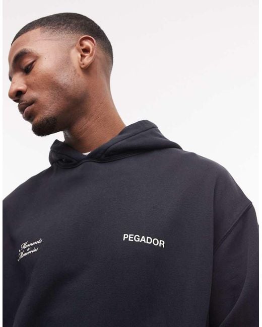 PEGADOR Black Rochefort Oversized Hoodie With Back Print Graphic for men