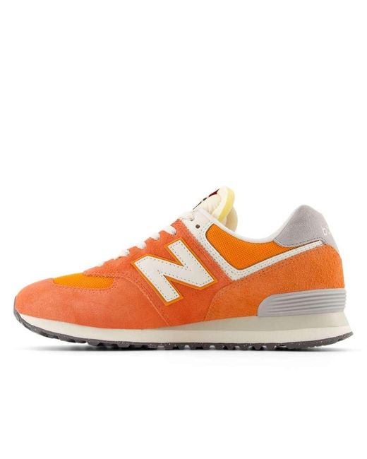 574 di New Balance in Orange