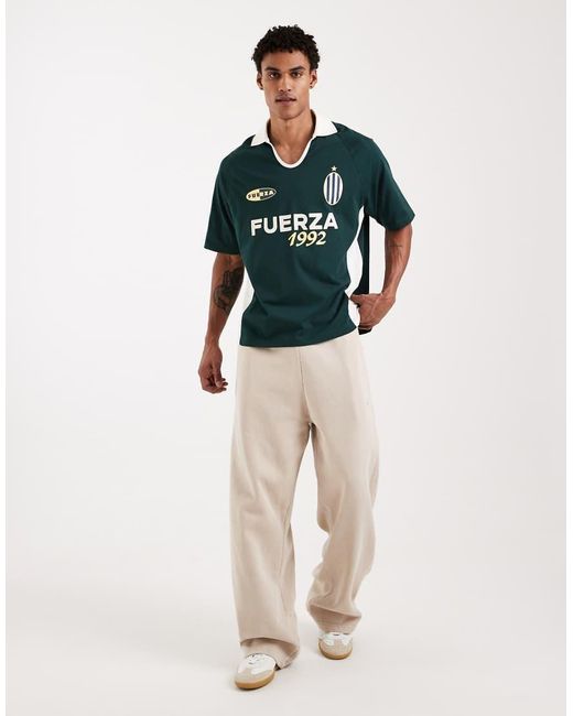 ASOS Green Relaxed Polo T-Shirt With Panels And Football Graphic for men