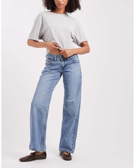 Jeans Ampi A Vita Super Bassa Slavato di Levi's in Blue