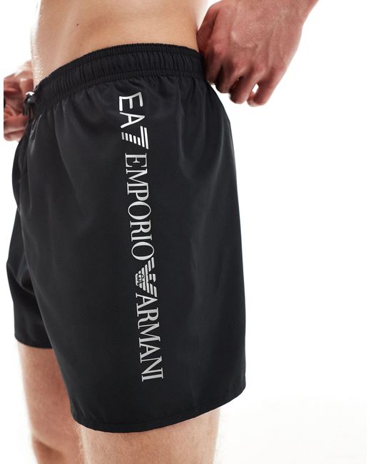 Armani - pantaloncini da bagno neri con logo laterale verticale di EA7 in Black da Uomo