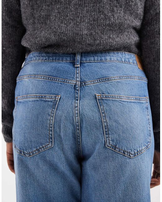 Tessa - jean ample à taille haute - moyen délavé Vero Moda en coloris Blue