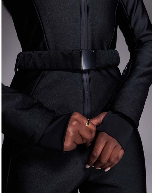 ASOS 4505 Ski & Snow Black Asos 4505 Ski Soft Shell Belted Ski Suit With Slim Kick Leg And Faux Fur Hood