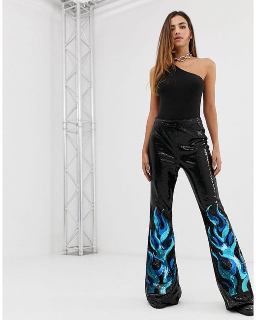 PRETTYLITTLETHING Black Festival Flare Trousers With Flame Details