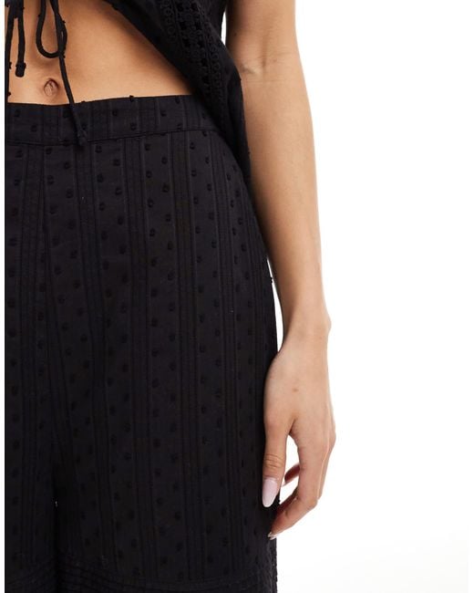 Pantalon d'ensemble en broderie anglaise effet coupé-cousu ASOS en coloris Blue